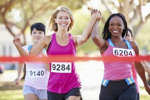 Two Female Runners Finishing Race Together